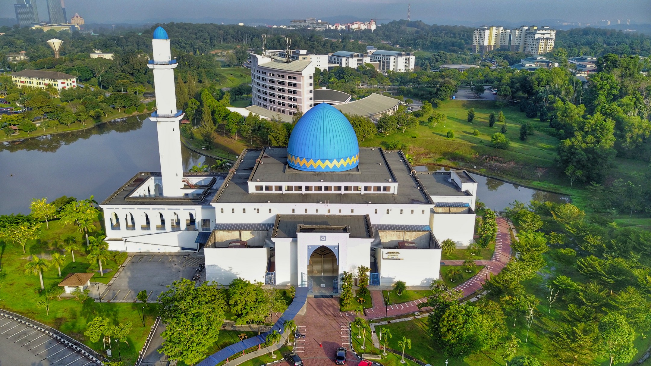 Blue-domed mosque beside a lake at UNITEN Putrajaya campus